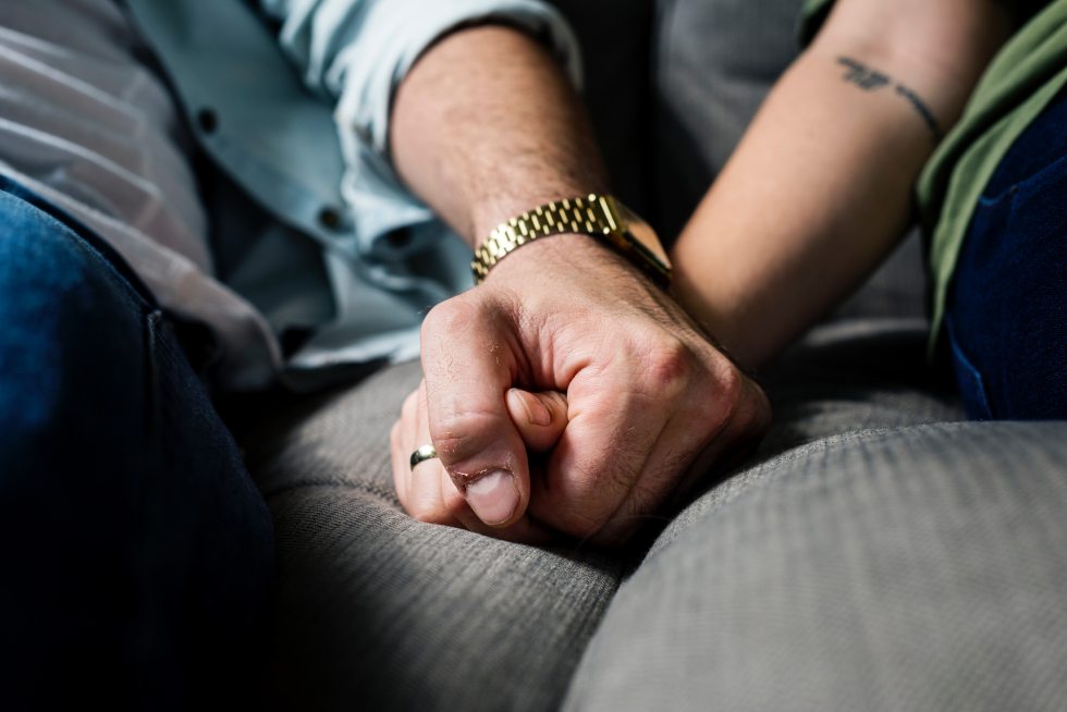 Christian couple holding hands together